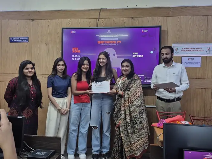 Winners posing with their certificates after the ceremony