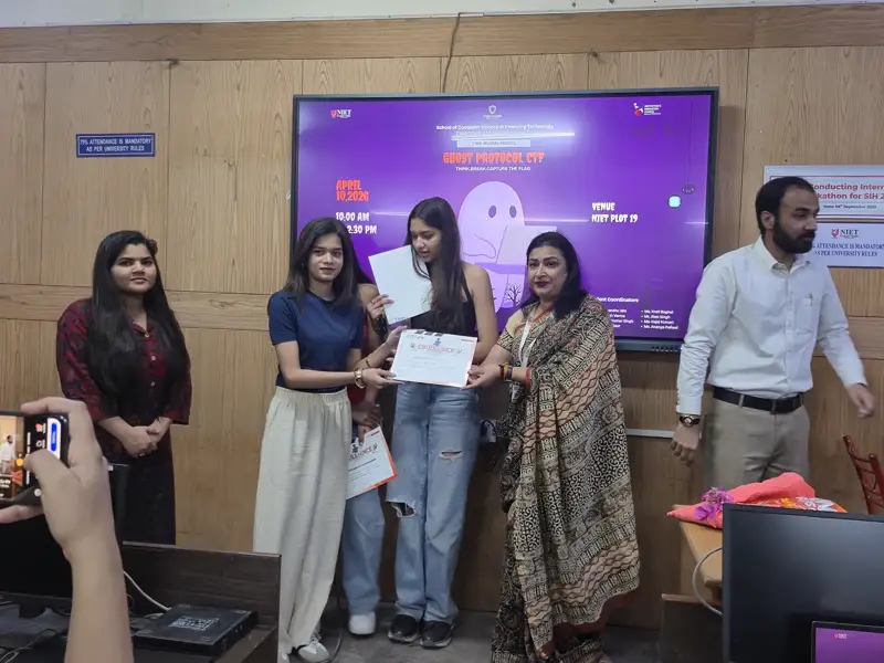 A certificate being presented to a winner