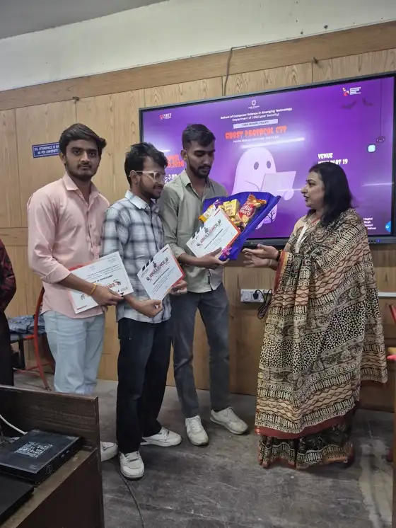 Winners receiving certificates and a prize hamper