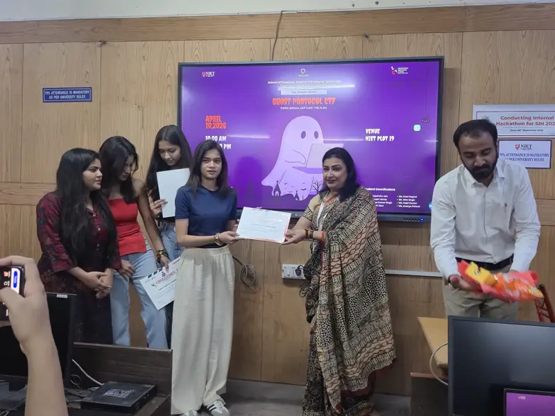 Winner receiving her certificate on stage