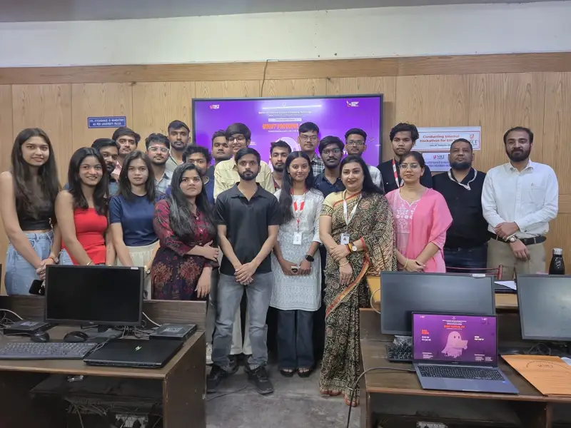 Full group portrait with the faculty coordinator