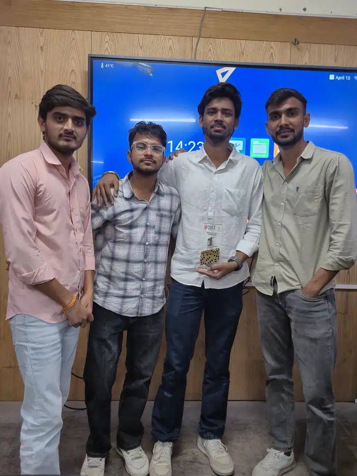 Winners posing with their certificates